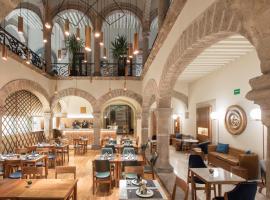 Hotel Herencia By Hosting House，位于莫雷利亚的酒店