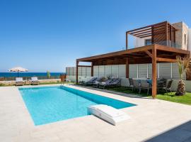 Lux Villa Nymphes Dioni, 30m from beach with Pool, BBQ and Play Area，位于斯泰洛米诺斯的酒店