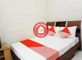 OYO 2860 The Castury Homestay Syariah，位于丹戎勒松的酒店