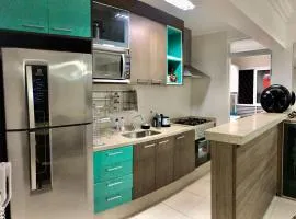 Spazio Felicita, Indaia, Bertioga, apartamento pé na areia