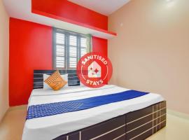 SPOT ON 77062 Kpt Lodge And Guest House，位于Attibele的酒店