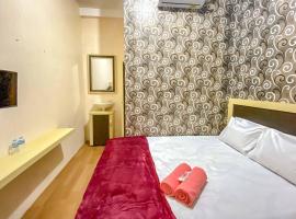 Tini's Guest House Malang Mitra RedDoorz，位于Betek的酒店
