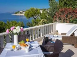 Luxury Beachfront Villa Primosten Oasis with private pool at the beach in Primosten