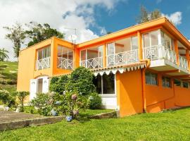 Maison de 2 chambres avec vue sur la mer jardin clos et wifi a saint joseph，位于Saint-Joseph的度假屋