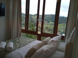 Apart Hotel Vista Azul - hospedagem nas montanhas，位于多明戈斯马丁斯的公寓式酒店