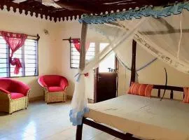 Room in Guest room - A wonderful Beach property in Diani Beach Kenyaa dream holiday place