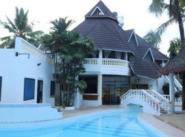 Room in Guest room - A wonderful Beach property in Diani Beach Kenyaa dream holiday place，位于蒙巴萨的民宿