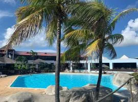 Appartement au village Manganao plage piscine