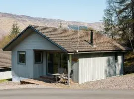 Deerstalker Lodge cozy lodge with wood burner