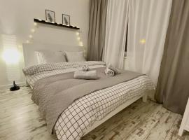 Cosy&White apartment in Daugavpils，位于陶格夫匹尔斯Daugavpils Church Hill附近的酒店