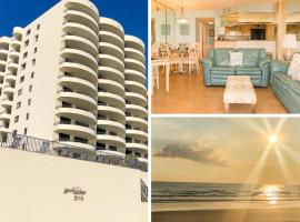 Sand Dollar Condominiums，位于德通纳海滩海岸的公寓式酒店