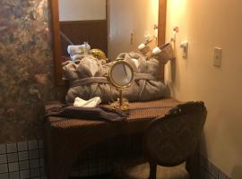 皇宫大酒店和水疗浴套房，位于尤里卡斯普林斯的酒店