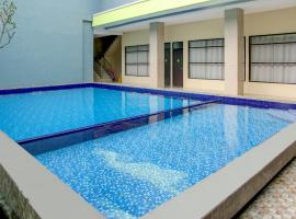 Capital O 3327 Grand Tawiri Hotel，位于安汶的酒店