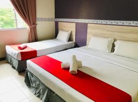 ESQ Ferringhi Hotel，位于Penaga的酒店