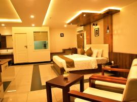 WHITE SUITE HOTEL，位于科泽科德的酒店