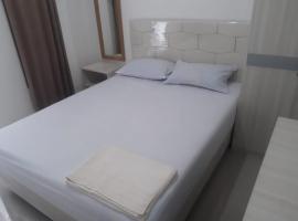 Paving Residence Manado RedPartner，位于Pineleng的酒店
