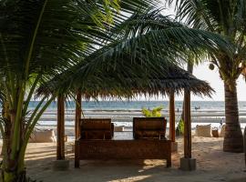 微风海滩小屋度假村，位于班塔延岛的酒店