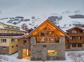 Chalet Prestige l'Atelier Lodge，位于莱德萨阿尔卑斯的酒店