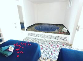 Exclusivo apartamento con piscina privada junto a la playa，位于甘迪亚的酒店