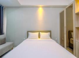 Homey and Warm Studio Apartment Oasis Cikarang By Travelio，位于芝卡朗的酒店