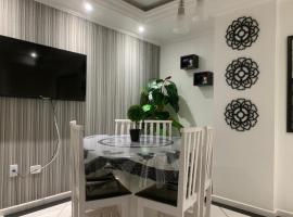 Apartamento Praia Central，位于巴拉奈里奥-坎布里乌乌尼普拉亚斯公园附近的酒店