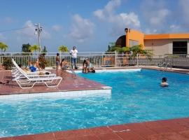 Romiar Resort Clubhouse，位于Las Piedras的酒店