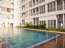 Apartemen Taman Melati Margonda by Winroom，位于Kukusan的酒店