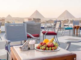 Nine Pyramids View Hotel，位于开罗的酒店