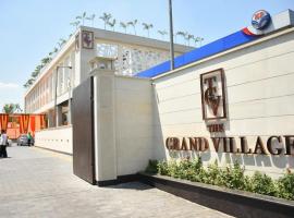 THE GRAND VILLAGE，位于莫拉达巴德的酒店
