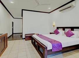 Treebo Tryst Travancore Palace Cherthala，位于Alleppey阿瑟卡尔圣安德鲁大教堂附近的酒店