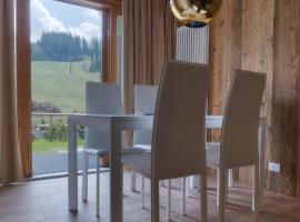 Chalet Golf Campiglio / LuxApt / fronte piste-impianti-golf，位于摩德纳迪-坎皮格里奥的酒店