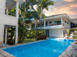 Pousada Palmeira Real，位于伊塔瓜伊的酒店