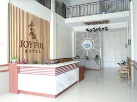 Joyful Hotel，位于丹戎潘丹的酒店