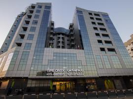 TIME Onyx Hotel Apartments，位于迪拜阿吉曼猎鹰队附近的酒店