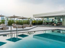 曼谷素坤逸通罗奥卓华庭酒店公寓，位于曼谷视觉空间附近的酒店