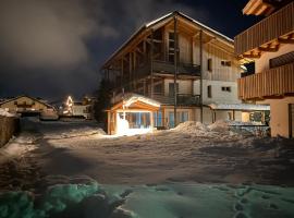 加尔尼 - 阿姆贝格休格尔酒店，位于圣坎迪朵的酒店