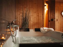 Le Bonheur de la Cascade 24 pers - Malmedy, wellness, jardin, confort，位于马尔梅迪的Spa酒店