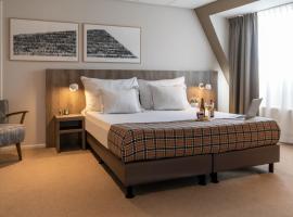 科波特酒店，位于恩克赫伊曾的酒店