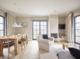 Reetland am Meer - Premium Reetdachvilla mit 3 Schlafzimmern, Sauna und Kamin E18，位于德兰斯克的酒店