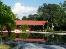 Suites del Sureste Dzibikak，位于Dzibikak的酒店