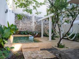 Hotel & Hostal Boutique Casa Garza，位于梅里达的酒店