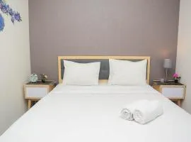 Cozy Stay 1BR at Grand Kamala Lagoon Apartment By Travelio