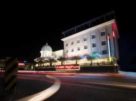AARYA MANSION V One Hotel，位于哈桑的酒店