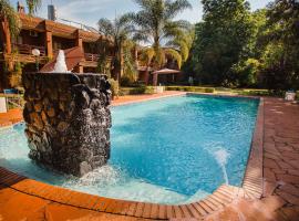 Hotel Che Roga，位于Puerto Eldorado的酒店