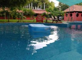 Paradise Vana Vilasa Homestay with Swimming pool，位于黎明之村的酒店