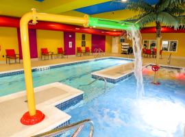 里贾纳舒适套房酒店，位于里贾纳的带泳池的酒店