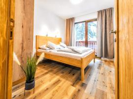 Apartments Srdiecko - JASNA South, SAUNA, FIREPLACE, FOREST View，位于塔莱的酒店