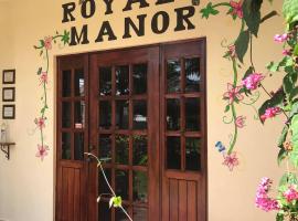Royale Manor，位于科罗萨尔圣塔丽塔科罗萨尔遗迹附近的酒店