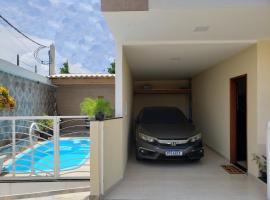 Casa Duplex Iriri - Banheira e Piscina，位于伊利利的酒店