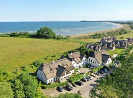 Strandhaus Mönchgut Ferienwohnung 06 mit Sauna- und Schwimmbadnutzung im AHOI Sellin，位于洛布的酒店